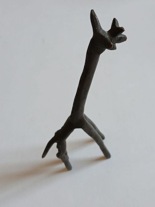 Girafa antiga em metal