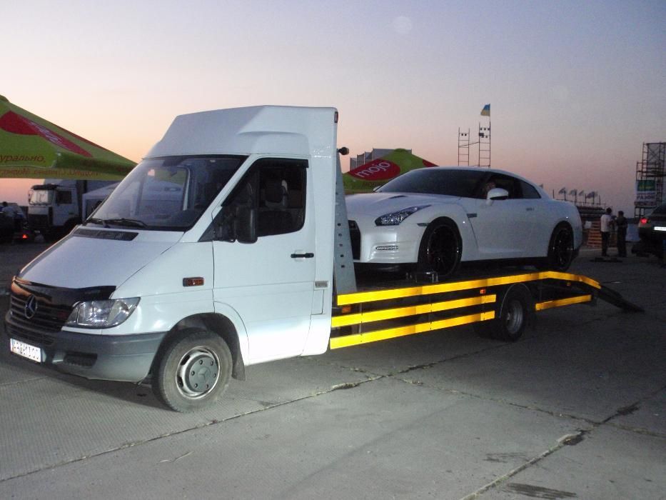 Эвакуатор , евакуатор по городу и Украине. Перевозка, буксировка авто
