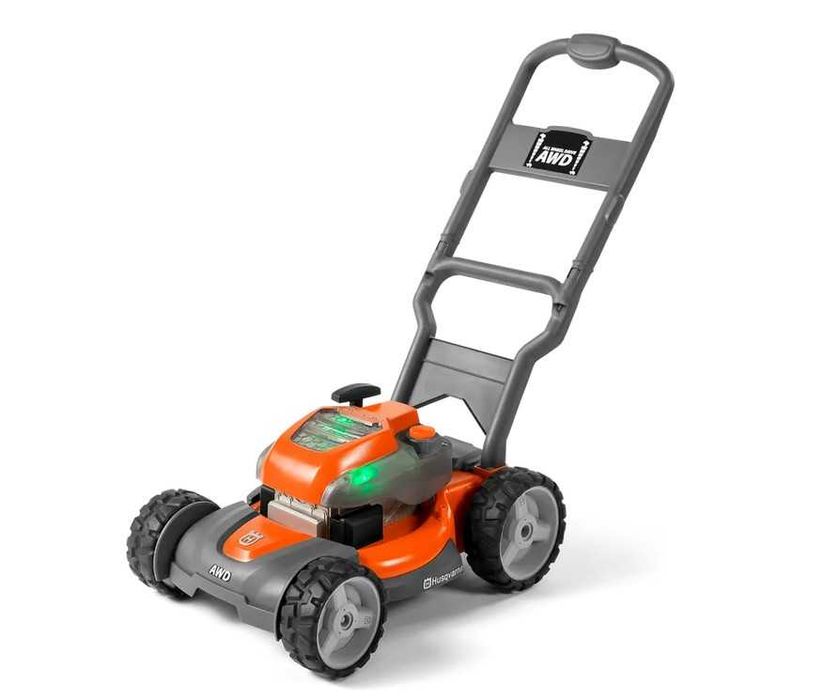 Zabawka kosiarka Husqvarna - poekspozycyjny przebarwienia na obudowie