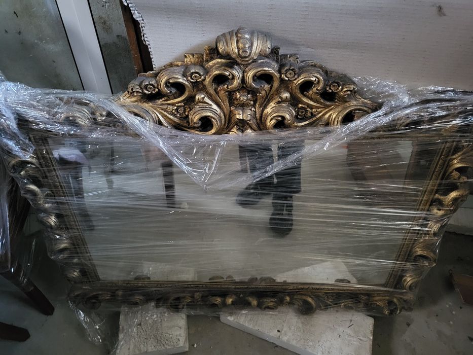 Espelho em talha dourada