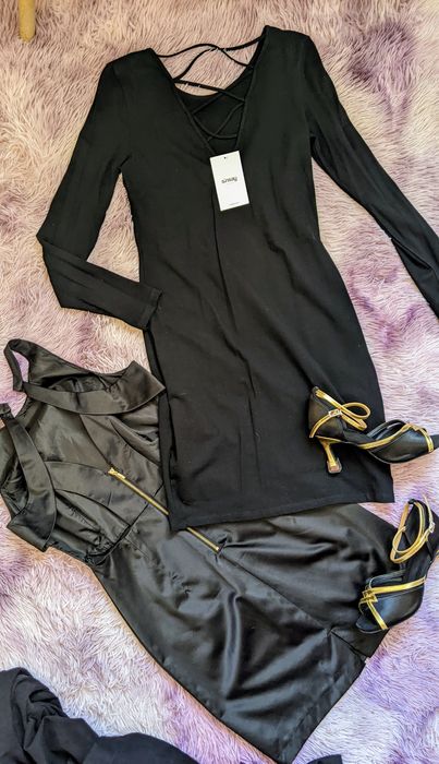 Одяг жіночий: спідниці, сукні, жакет