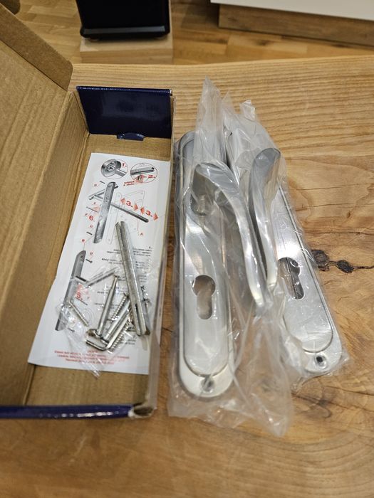 Klamka drzwiowa Domino Nowa