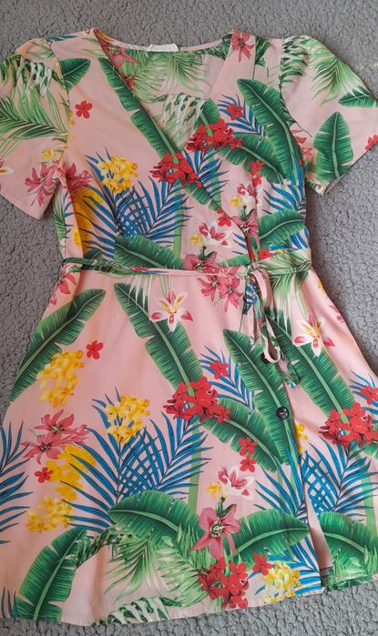 Sweter w kolorowe paski