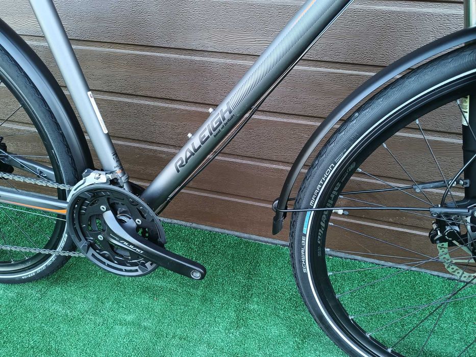 Rower 28" Raleigh 3x9 Alivio/Deore Hollowtech Hydraulika Dynamo Amortyzator Blokada Duża Rama