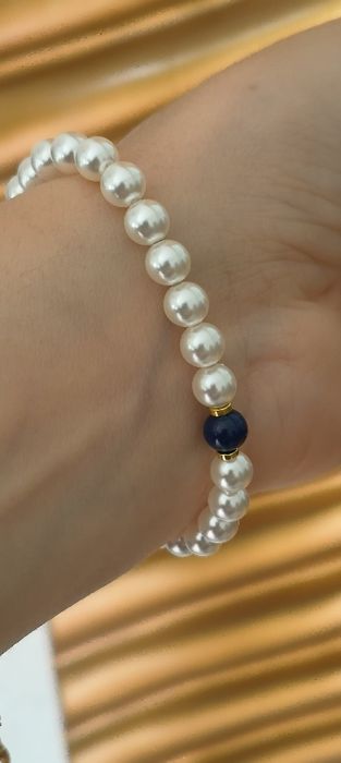 Pulseira pérolas com caramujo em prata