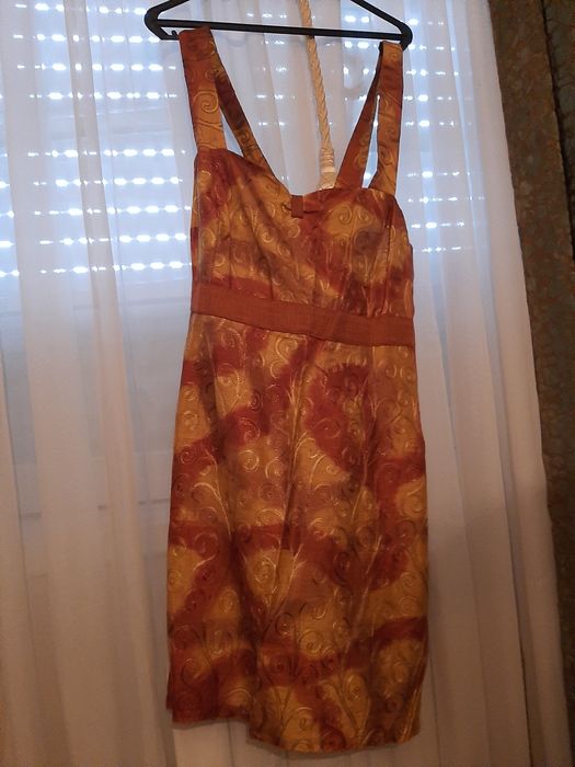 Lote de vestidos de seda e casacos