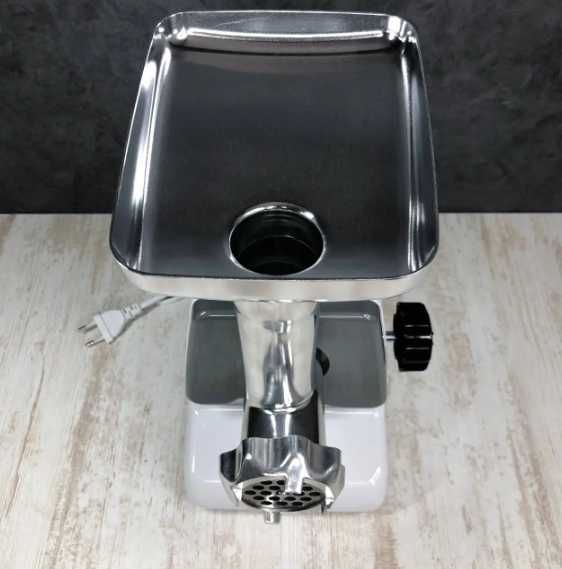 Мясорубка. Электро мясорубка с реверсом с соковыжималкой томатов