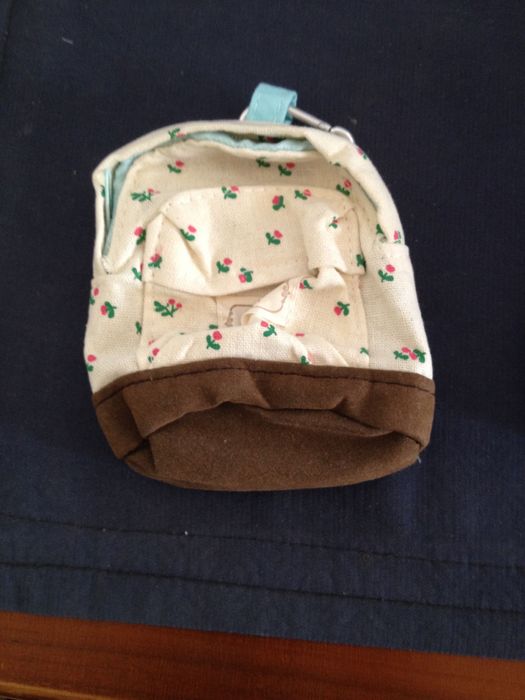 Mini mochila em tecido - 1 cor à escolha