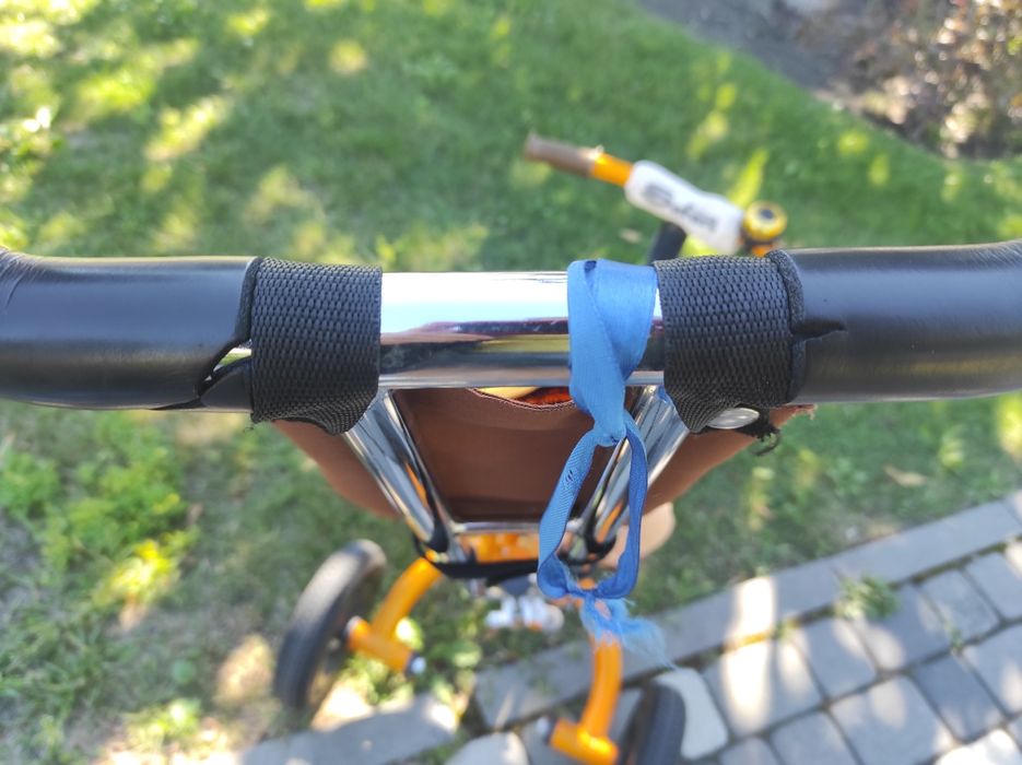 Велосипед з батьківською ручкою