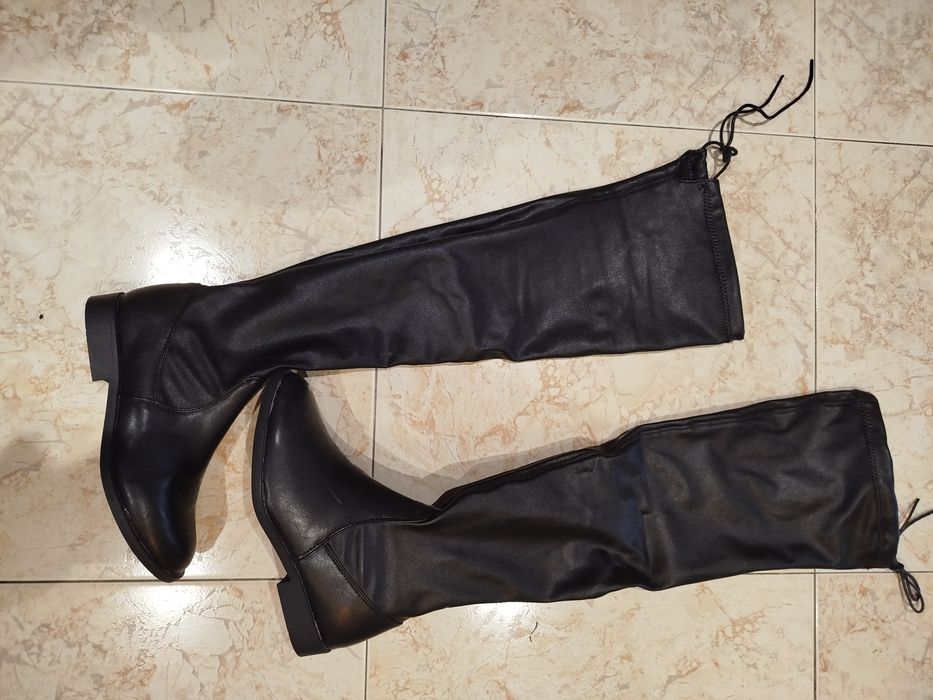 Bota cano alto   .