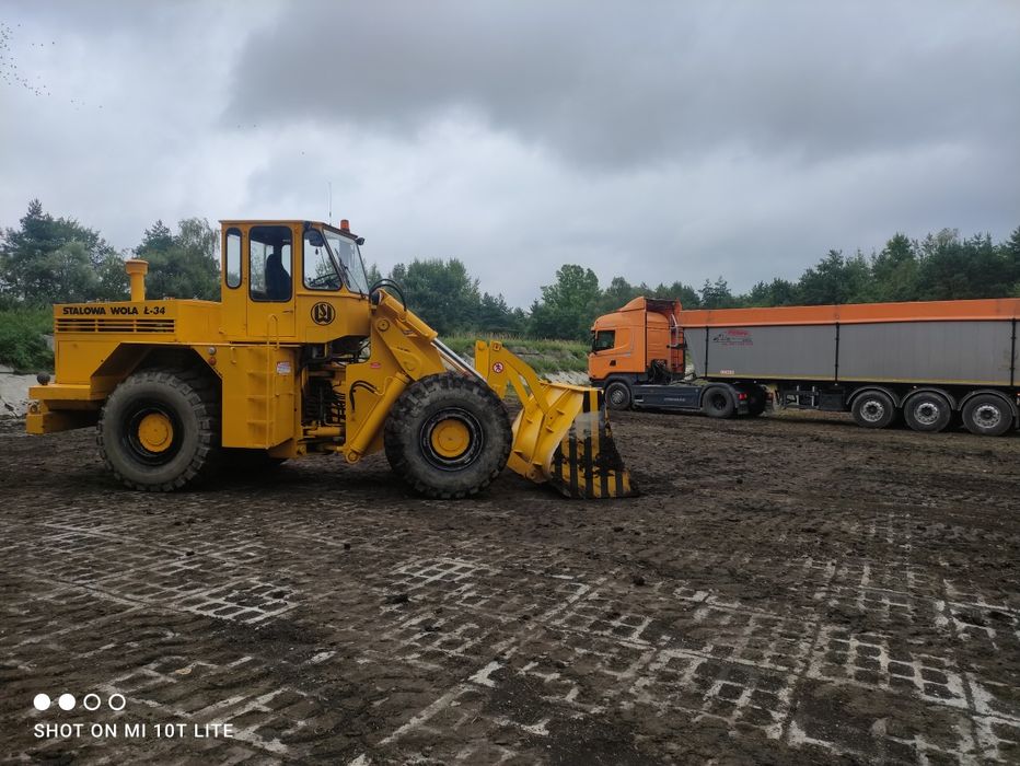 Usługi koparką obrotową i wywrotką transport koparko ładowarka