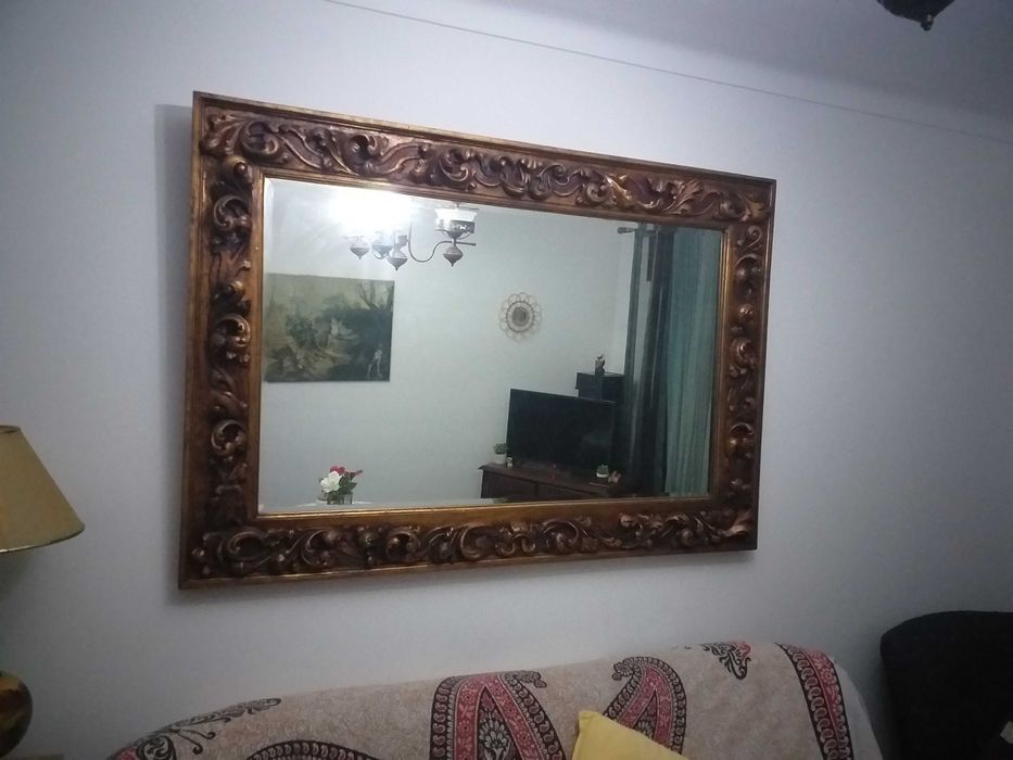 Espelho antigo em talha dourada