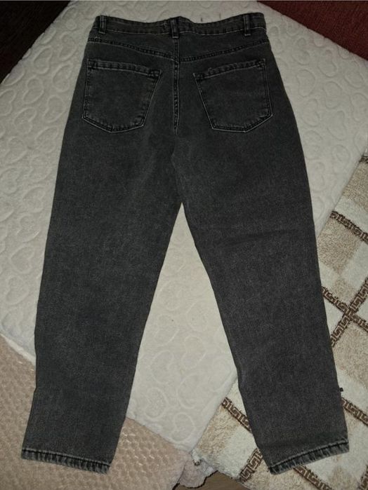 Рвані джинси розмір L