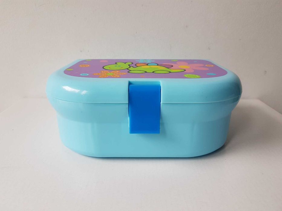 Niebieska plastikowa śniadaniówka lunchbox z zielonym dinozaurem