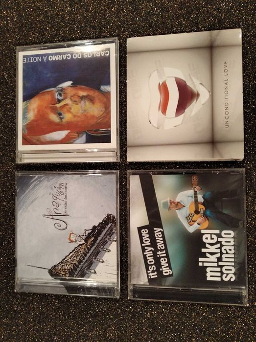 CD's pop, rock, hip hop, chill, fado, folk, Bollywood, ...