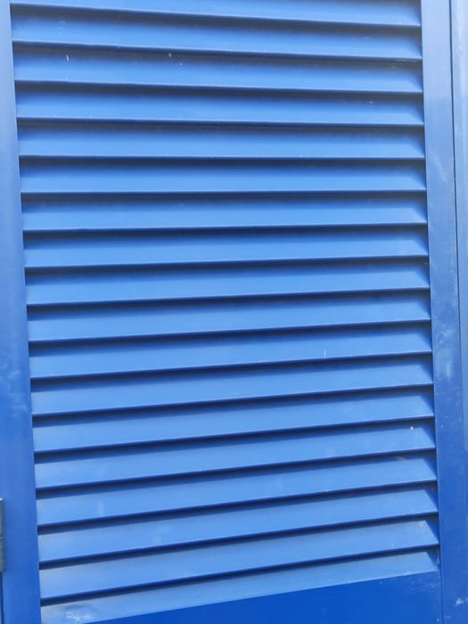 Janelas duplas com portadas