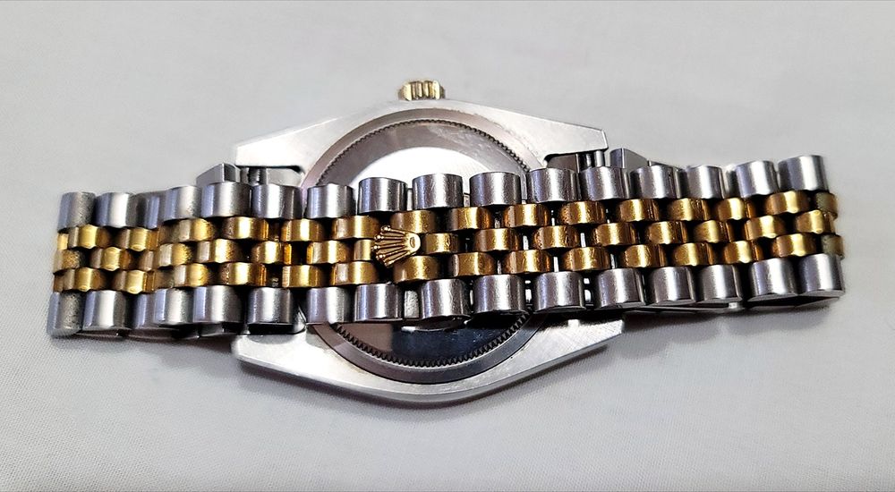 Швейцарские часы Rolex в белом цвете с золотом корпус из нерж.стали механизм quartz выпуск Swiss 80х годов марка времён ссср