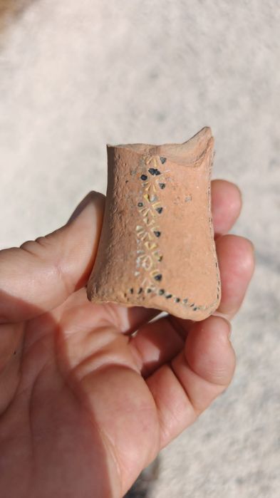 Peça cerâmica antiga (fragmento paliteiro))