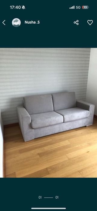 Sofa cama cinza em tecido