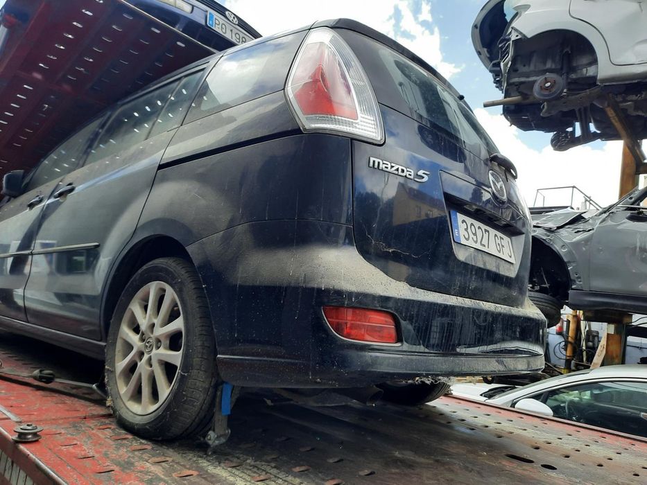 Farol Esquerdo Mazda 5