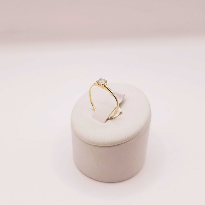 Złoty pierścionek pr. 585 - Zaręczynowy z oczkiem 0,85g. | r.12