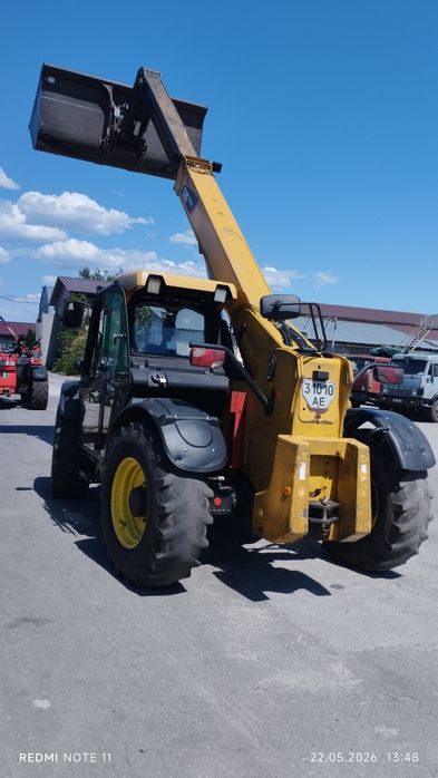 Продам телескопический погрузчик cat 407 c