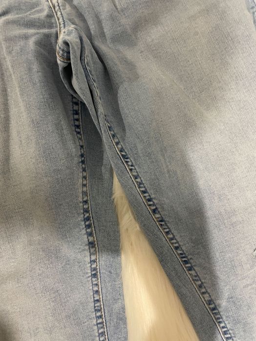 Niebieskie jeansy Reserved 40