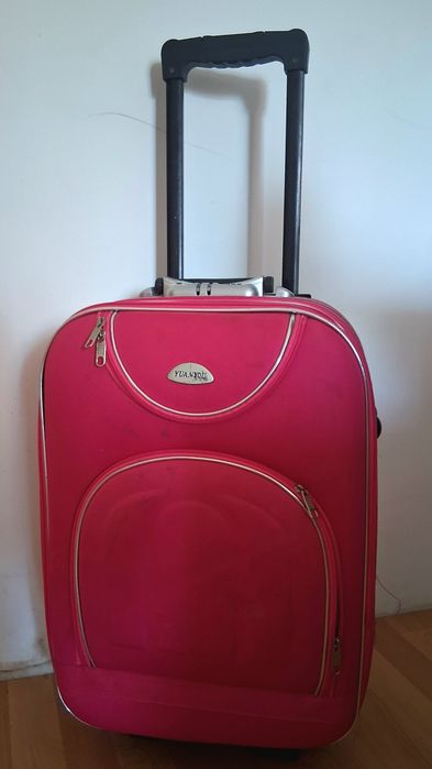 Mala de viagem rosa