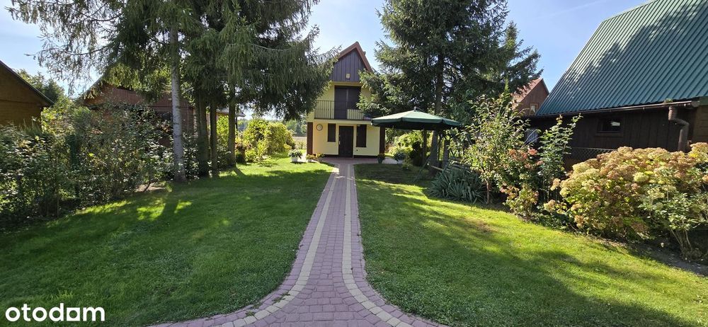 Działka rekreacyjna z domkiem całorocznym nad jeziorem Piaseczno
