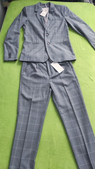 Reserved 146 nowy  garnitur marynarka i spodnie