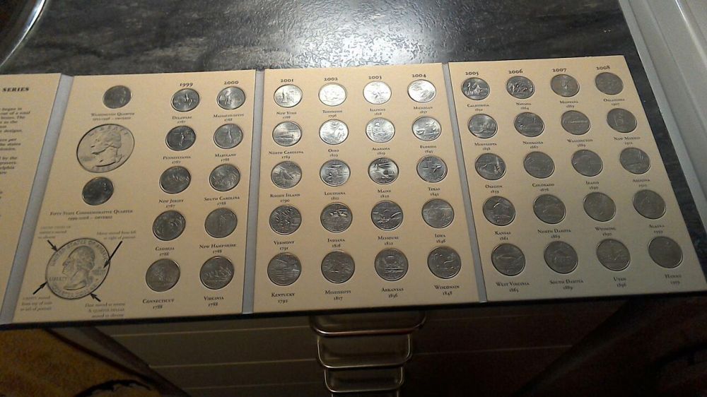 Colecção comemorativa de moedas sobre os 50 estados USA.
