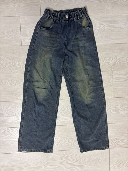 джинсі темно сині з потертостями на колінах