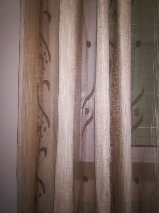 Conjunto de cortinados com argolas