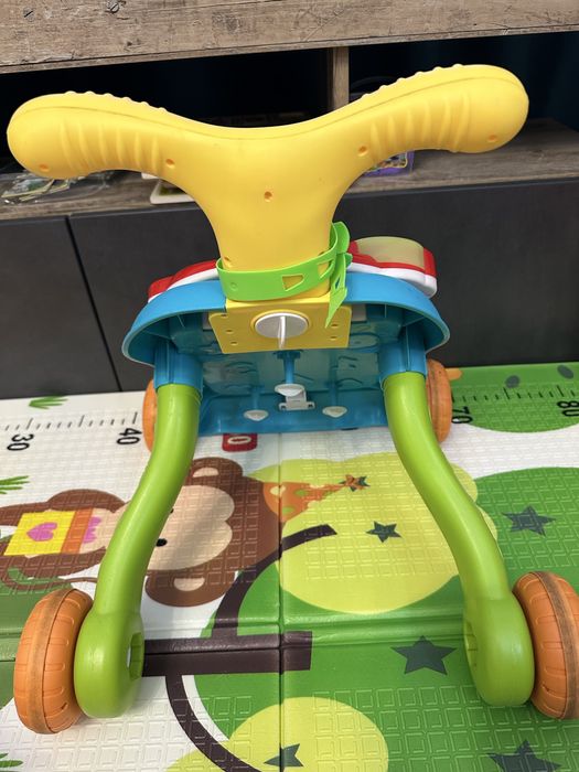 Дитяча каталка ходунки