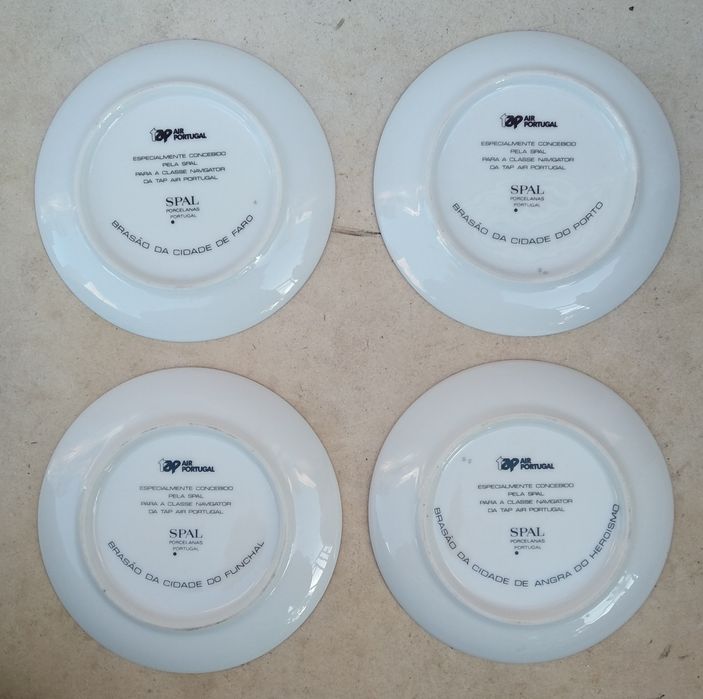 Coleção de pratos da TAP com brasões de cidades
