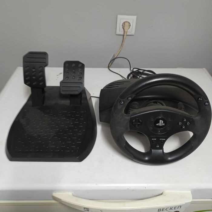 Volante e pedais da playstation
