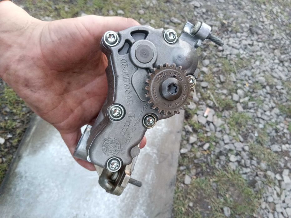 06J115106AB маслонасос