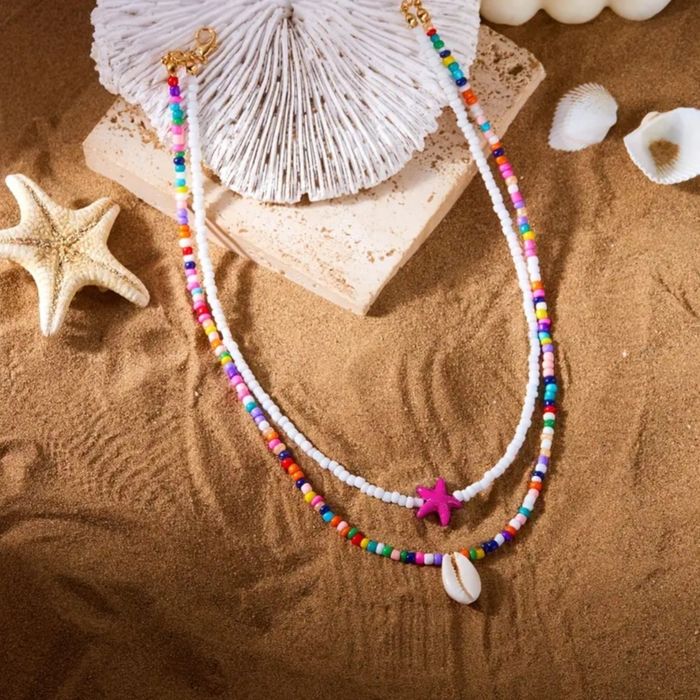 Kolorowe naszyjniki boho z muszelką i rozgwiazdą