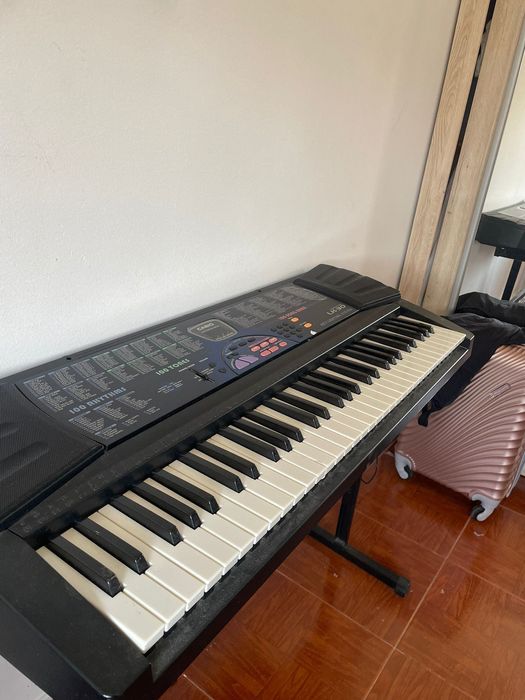 Teclado Casio com64297946008449123