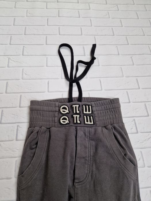 Robert Kupisz spodnie dresy logo