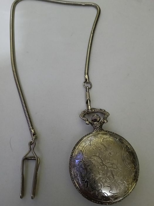 Tenho um relógio de bolso e um mira para venda