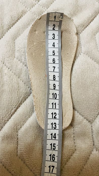 дитячі чоботи Bogs з камуфляжним принтом.