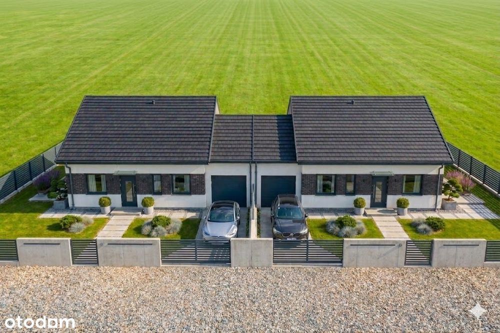 Dom parterowy 116,60 m² z garażem w zabudowie bliźniaczej - Widok 2