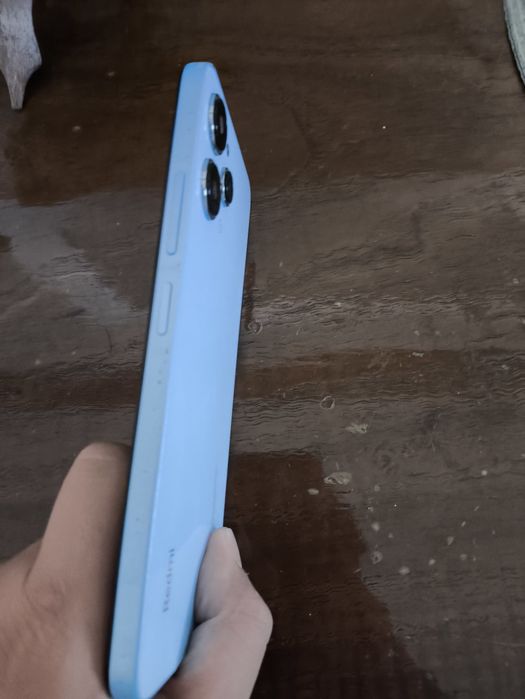 Redimi 12 azul  saí carregado com capa
