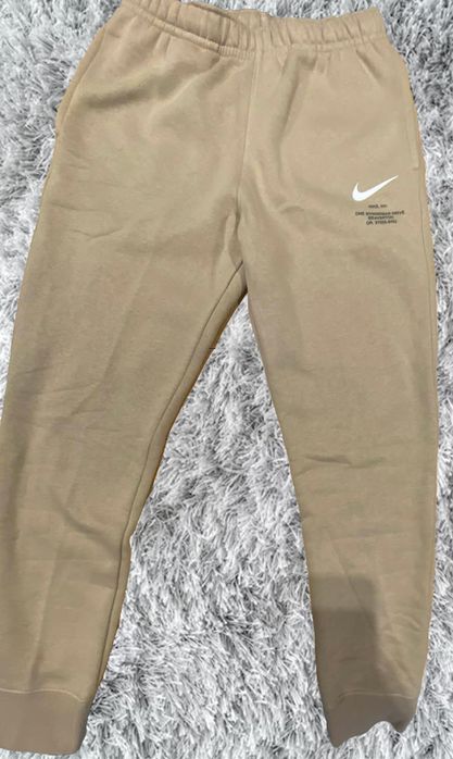 Nike spodnie Standered Length Taper Leg Regular Length