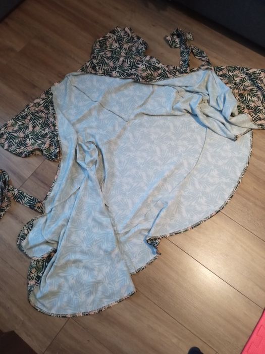 Przekładana sukienka elegancka, regulowana wiązaniem