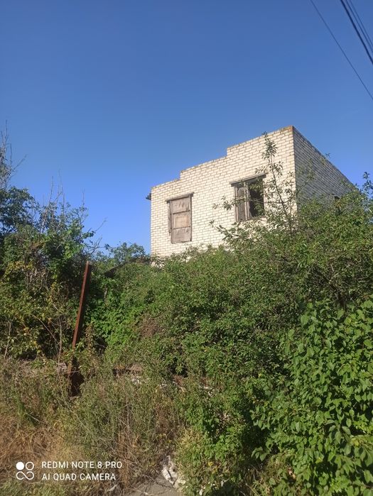 Участок с двухэтажным домом