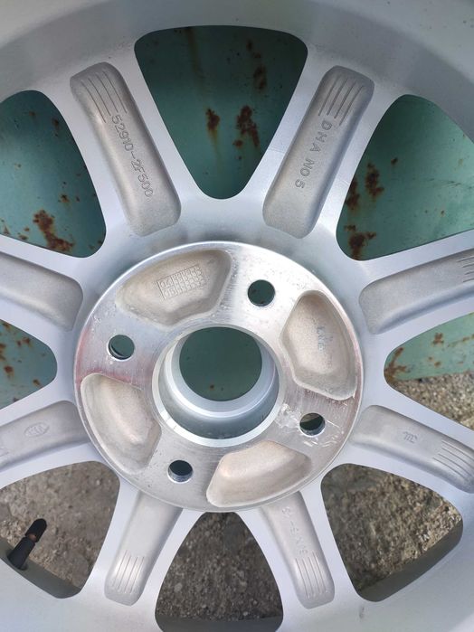 Bridgestone Potenza RE050 205/50 R16 87V + Диск kia 16" et43 4x114,3