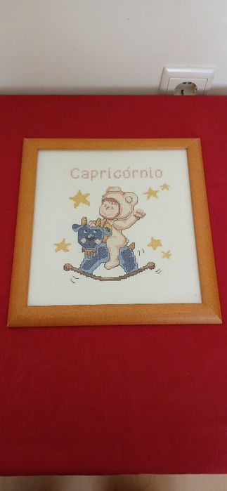 Quadro bordado a ponto cruz