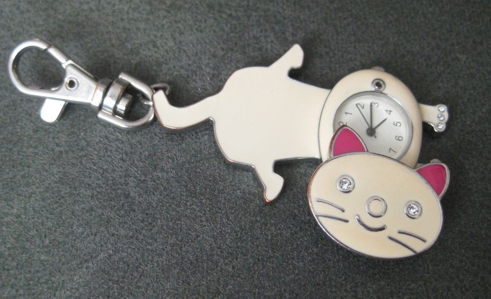 Pocket Watch with Cat Clasp Requiring Repair